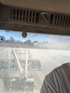 Mark Freeman Planting Alfalfa Mark Freeman in his tractor with a landplane doing preparatory work to plant alfalfa at the farm